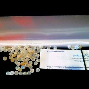 Pure natural rainbow moonstones 1 caret each